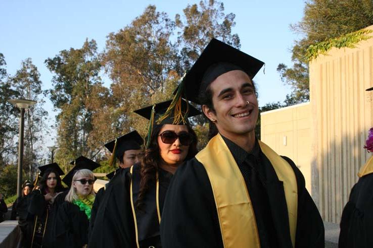 Students on walkway at Commencement